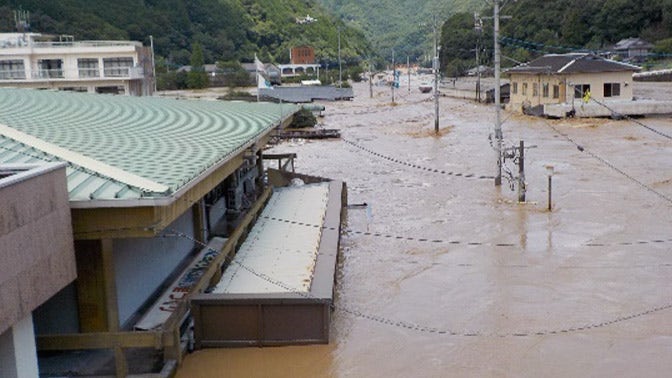 当時の八代市役所坂本支所付近の浸水状況（坂本町復興計画より）