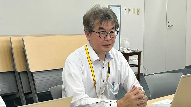 インタビューに答える田畑氏